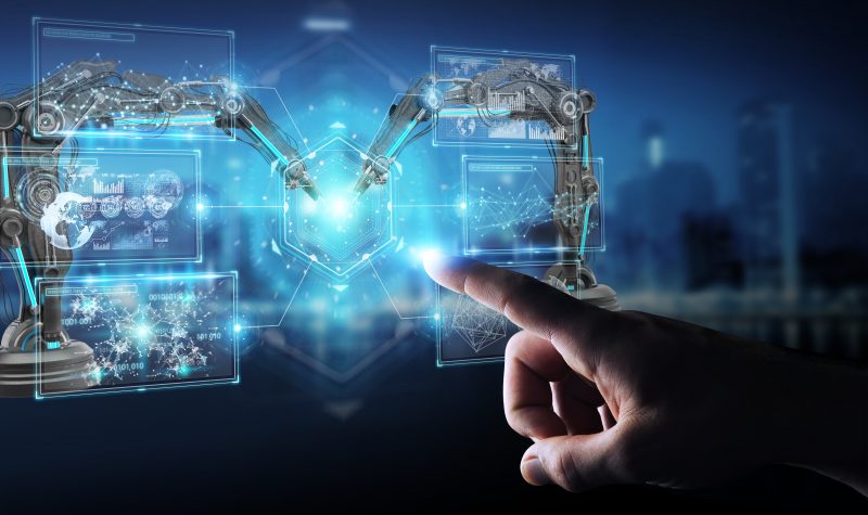 Businessman using robotics arms with digital screen 3D rendering Businessman using robotics arms with digital screen 3D rendering
